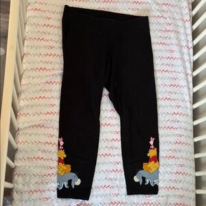 EUC Black Capri Leggings with Winnie-the-Pooh, Size Large (Torrid 0)